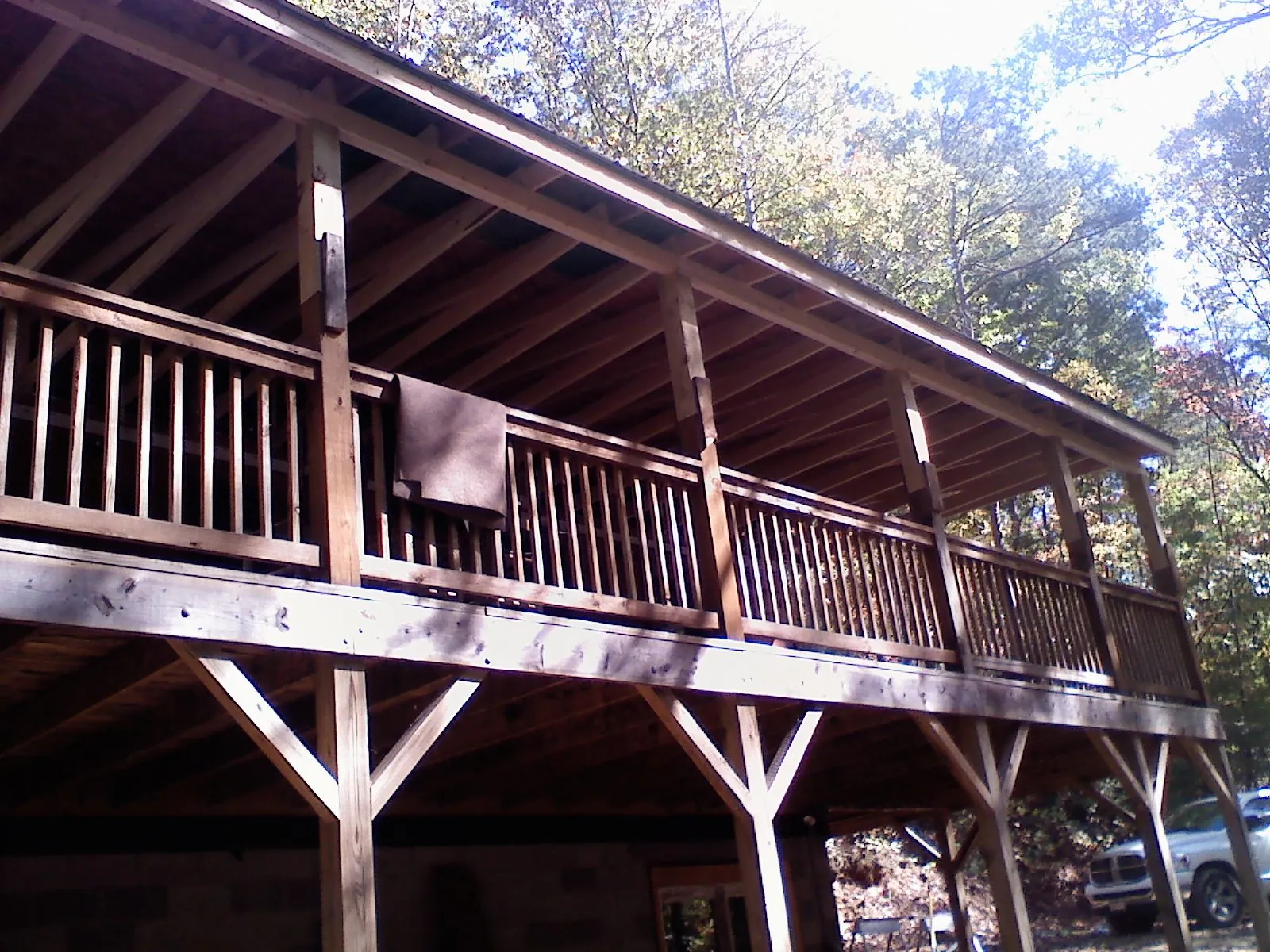 Timber framing under a new elevated porch and deck — Roof Leak Repair in South Saint Paul by Roofing Brothers